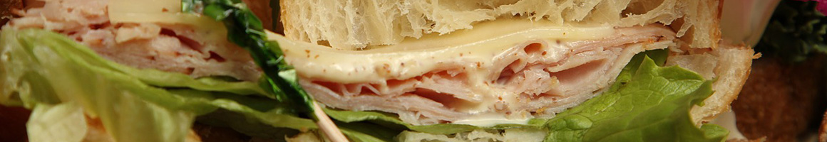 Eating Deli Sandwich Cafe at PS Gourmet Coffee restaurant in Boston, MA.